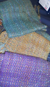 Several scarves woven by Vicky using "stash" yarn purchased at an estate sale